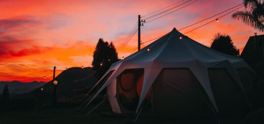 Tent at sunset, illustrating portable power for camping