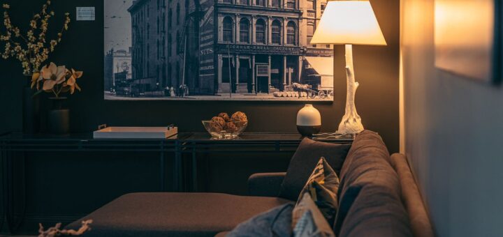 Living room with lamps and seating; illustrative household electricity-use image